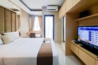 Serene and Homey Studio at Transpark Bintaro Apartment By Travelio