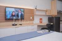 Minimalist Studio Room at Springwood Residence Tangerang Apartment By Travelio