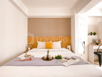 Comfy Warm Tone 1BR at Apartment Bassura City By Travelio