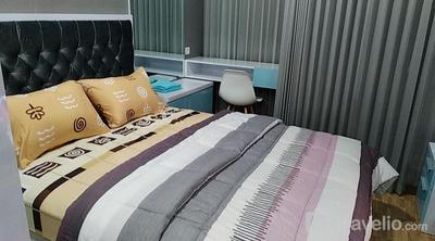 Grey Studio Room 20 with Wood Floor At Tamansari Prospero Apartment Sidoarjo