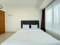 Apartemen Grand Kamala Lagoon - Practical Semi Furnished 2BR at Grand Kamala Lagoon Apartment By Travelio