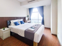 Simple 1BR near Mall at Grand Sungkono Lagoon Apartment By Travelio