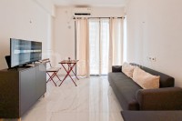 Cozy and Pool View 2BR at Sky House BSD Apartment By Travelio