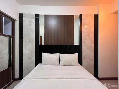 Warm and Cozy 2BR Vida View Makassar Apartment By Travelio