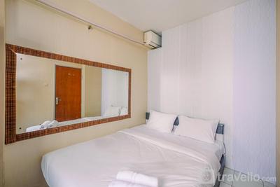 2BR at Cibubur Village Apartment By Travelio