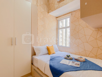 Basic 2BR near Bojong Indah Station at Vittoria Residence Apartment By Travelio