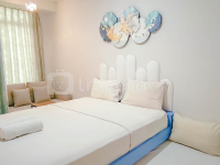 Blue Accent Studio at Delft Ciputra Makassar Apartment By Travelio