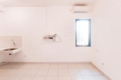 Apartemen Eco Home Residence - Comfy Unfurnished Studio Apartment with AC at Eco Home Residence By Travelio