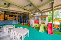 Apartemen Grande Valore Condominium - Wonderful and Pool View 1BR Apartment Grande Valore Condominium By Travelio