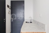 Apartemen Collins Boulevard - Studio Unfurnished at Collins Boulevard Apartment By Travelio