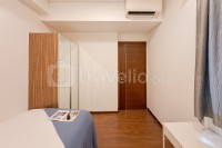 Apartemen Marigold Nava Park - Modern Wood Accent 2BR at Marigold Nava Park Apartment By Travelio