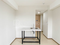 Apartemen Meikarta - New Unfurnished Studio with AC at 2nd Floor Meikarta Apartment By Travelio