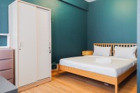 Serene and Relaxing 1BR Emerald Bintaro Apartment By Travelio