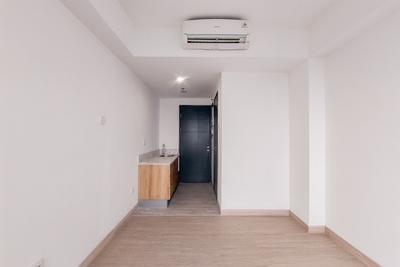 Apartemen Collins Boulevard - Cozy Studio Unfurnished Apartment with AC at Collins Boulevard By Travelio