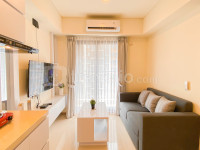 Minimalist Tidy 2BR at Meikarta Apartment By Travelio