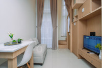 Serene Wooden Touch Studio Loft at Apartment Apple 1 Condovilla By Travelio