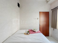 Apartemen Puncak Permai - 2BR near Lenmarc Mall at Puncak Permai Apartment By Travelio