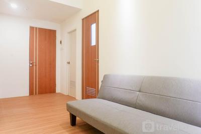 Apartemen Puncak Dharmahusada - Exquisite 2BR Apartment at Puncak Dharmahusada By Travelio