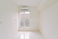 Comfortable 2BR Unfurnished with AC at Podomoro Golf View Apartment By Travelio