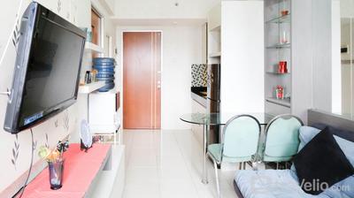 Homey and Compact 2BR at Puncak Kertajaya Apartment By Travelio