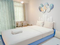 Blue Accent Studio at Delft Ciputra Makassar Apartment By Travelio