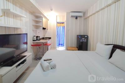 Nice and Cozy Studio at Bassura City Apartment By Travelio