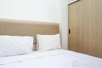 Apartemen Puncak Dharmahusada - Exquisite 2BR Apartment at Puncak Dharmahusada By Travelio