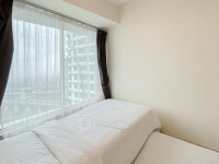 Apartemen Grand Kamala Lagoon - Practical Semi Furnished 2BR at Grand Kamala Lagoon Apartment By Travelio