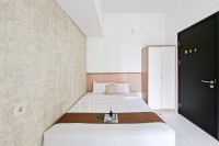 Lavish White 1BR at Casa de Parco Apartment By Travelio