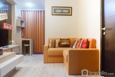 Homey 2BR Apartment at Tamansari Papilio By Travelio