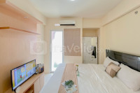 Nice Studio Green Pramuka City Apartment near Shopping Center By Travelio