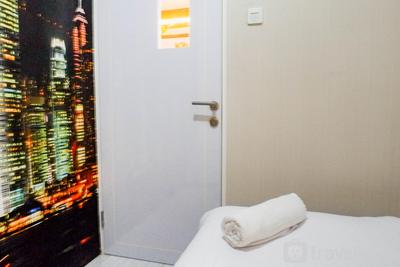 Apartemen Puncak Dharmahusada - Relaxing and Serene 2BR Apartment at Puncak Dharmahusada By Travelio