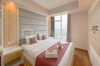 Comfy and Spacious 2BR at Grand Sungkono Lagoon Apartment By Travelio