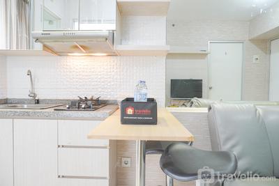 Comfort and Homey 2BR at Green Bay Pluit Apartment By Travelio
