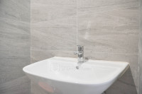 Apartemen Collins Boulevard - Unfurnished Studio with AC at Collins Boulevard Apartment By Travelio
