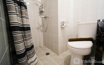 Apartemen Puncak Dharmahusada - Spacious 3BR Combined at Puncak Dharmahusada Apartment By Travelio