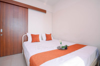 Modern and Homey 1BR without Living Room at Grand Kamala Lagoon Apartment By Travelio