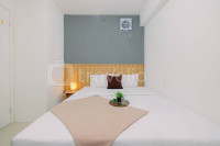 Compact with Minimalist Designed 2BR at Bassura City Apartment By Travelio