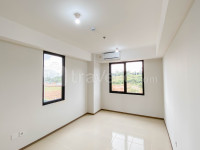 Apartemen Meikarta - New Unfurnished Studio with AC at 2nd Floor Meikarta Apartment By Travelio