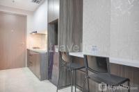 Warm and Minimalist 1BR at Puri Orchard Apartment By Travelio