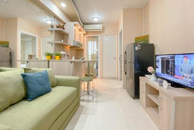 Tranquil and Homey 2BR at Apartment Green Pramuka City By Travelio