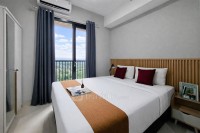 Classic and Homey Gray Studio at Apartment The Ayoma By Travelio