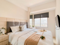 Strategic 2BR Apartment at Greenlake Sunter By Travelio