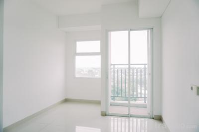 Compact Unfurnished Studio at 11th Floor Serpong Garden Apartment By Travelio