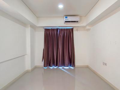 Good Deal 2BR Unfurnished with AC at Meikarta Apartment By Travelio