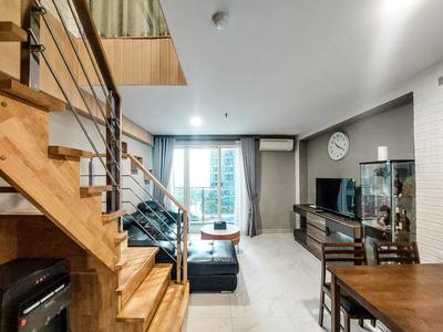 Good and Homey 2BR Loft at Grand Jati Junction Apartment By Travelio