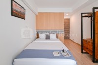 Monochromatic 2BR with Extra Working Room Apartment Sky House BSD By Travelio