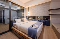 Well Furnished 1BR at Collins Boulevard Apartment By Travelio