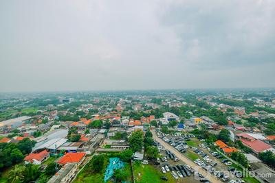 Apartemen Grand Dhika City Jatiwarna - Stylish and Posh Studio Grand Dhika City Apartment By Travelio