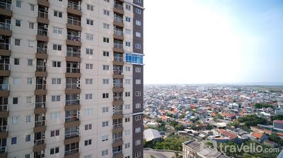 Apartemen Puncak Dharmahusada - Spacious 3BR Combined at Puncak Dharmahusada Apartment By Travelio